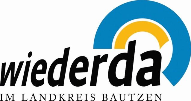 Logo von Wiederda im Landkreis Bautzen mit bunten kreisförmigen Elementen.